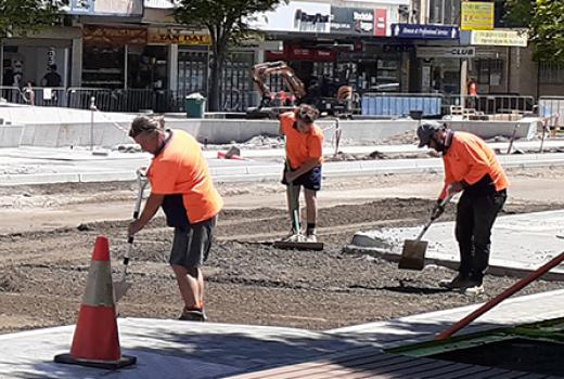 Workers building new surface on Hampshire Road